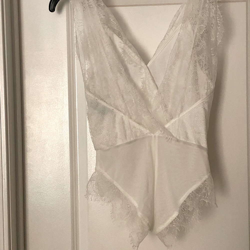 Vici Dolls white Vixen Lace Bodysuit from Lovestitch in size small